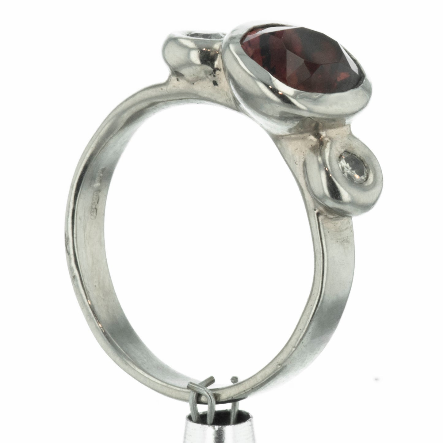 Trilogy ring with zircon