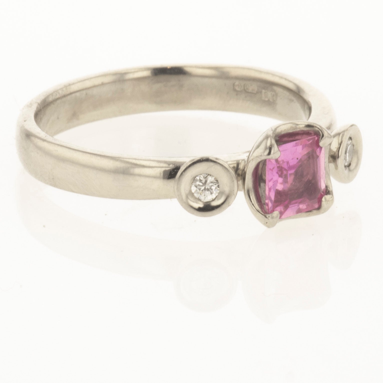 pink sapphire trilogy ring